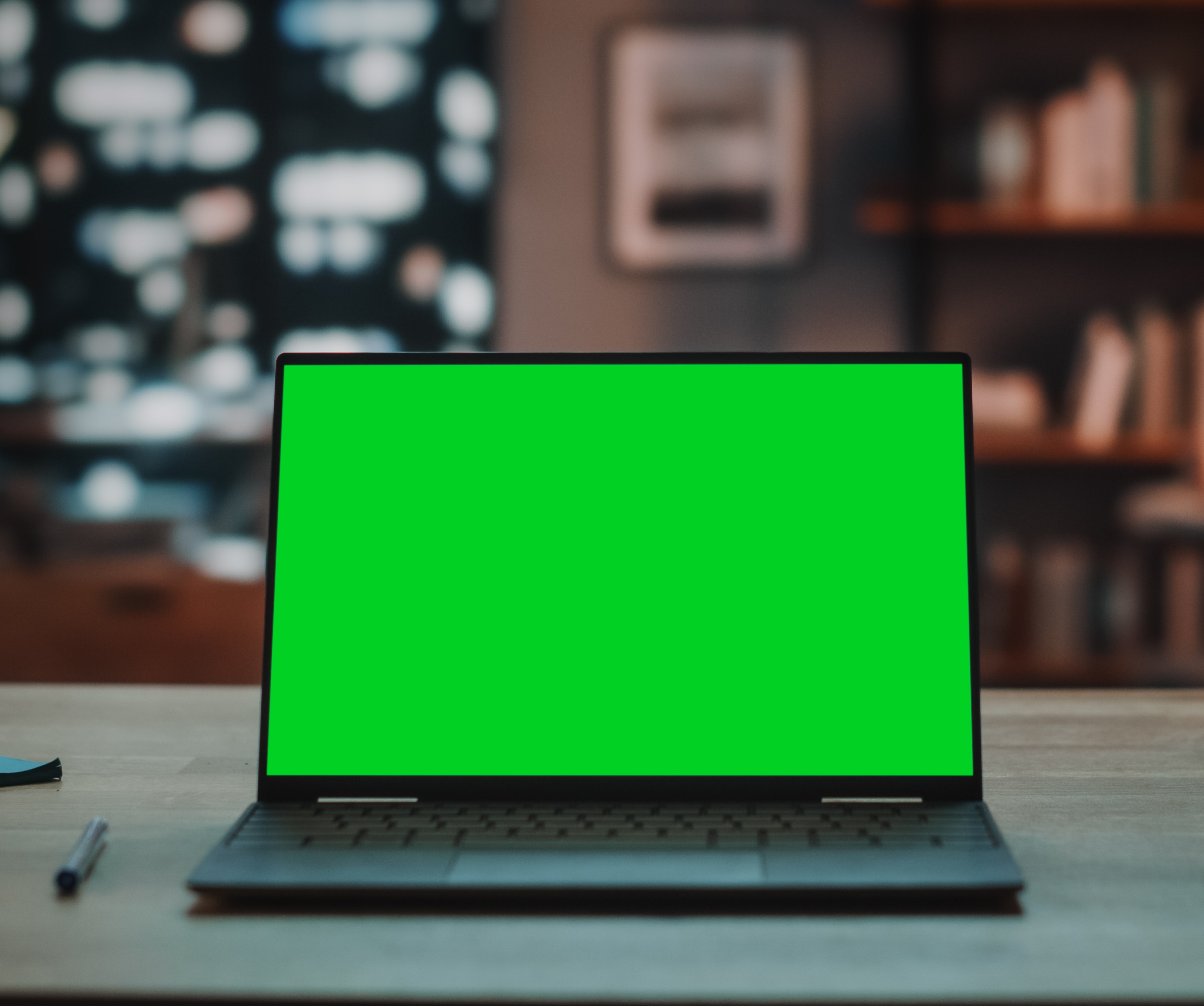 A laptop with green screen