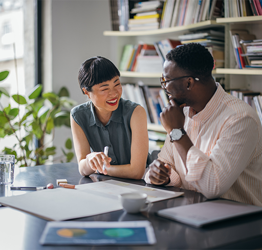 Man and woman in the table working together