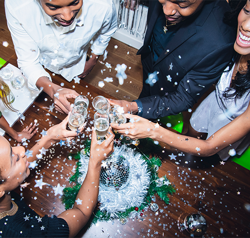 People celebrating and tossing wine