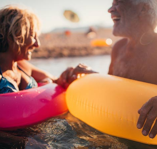 Older couple in ocean