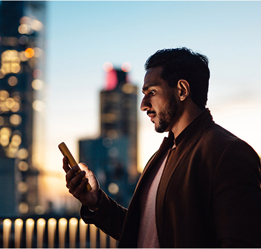 Man in front of city skyline