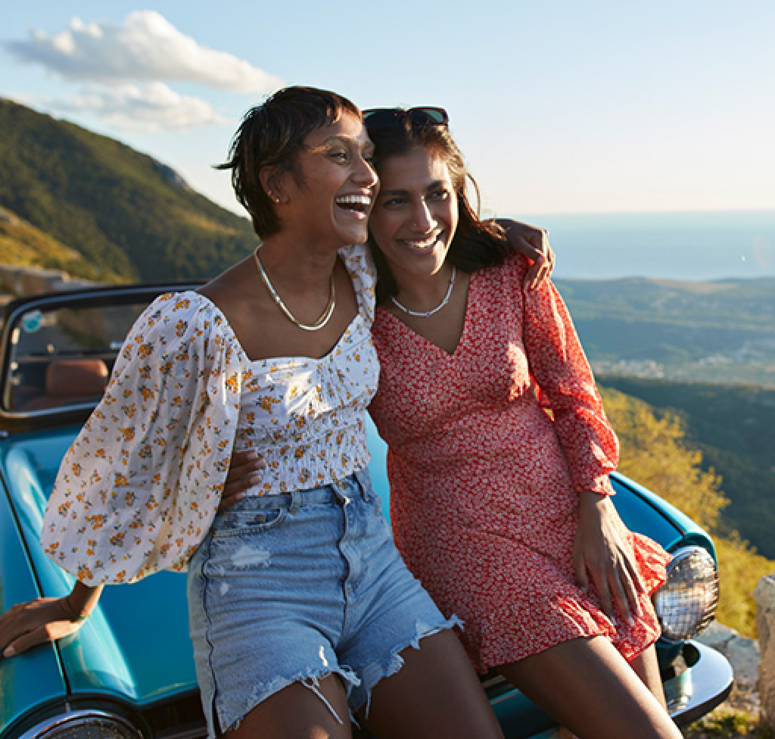 Two women looking over landscape