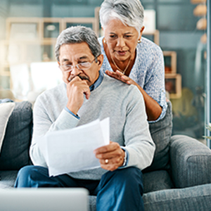Old couples looking at the document