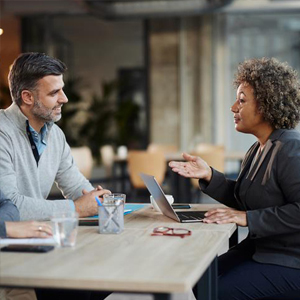 Two people consulting