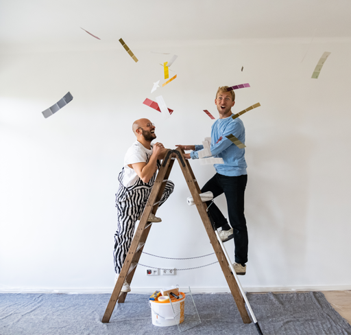 Two persons with ladder