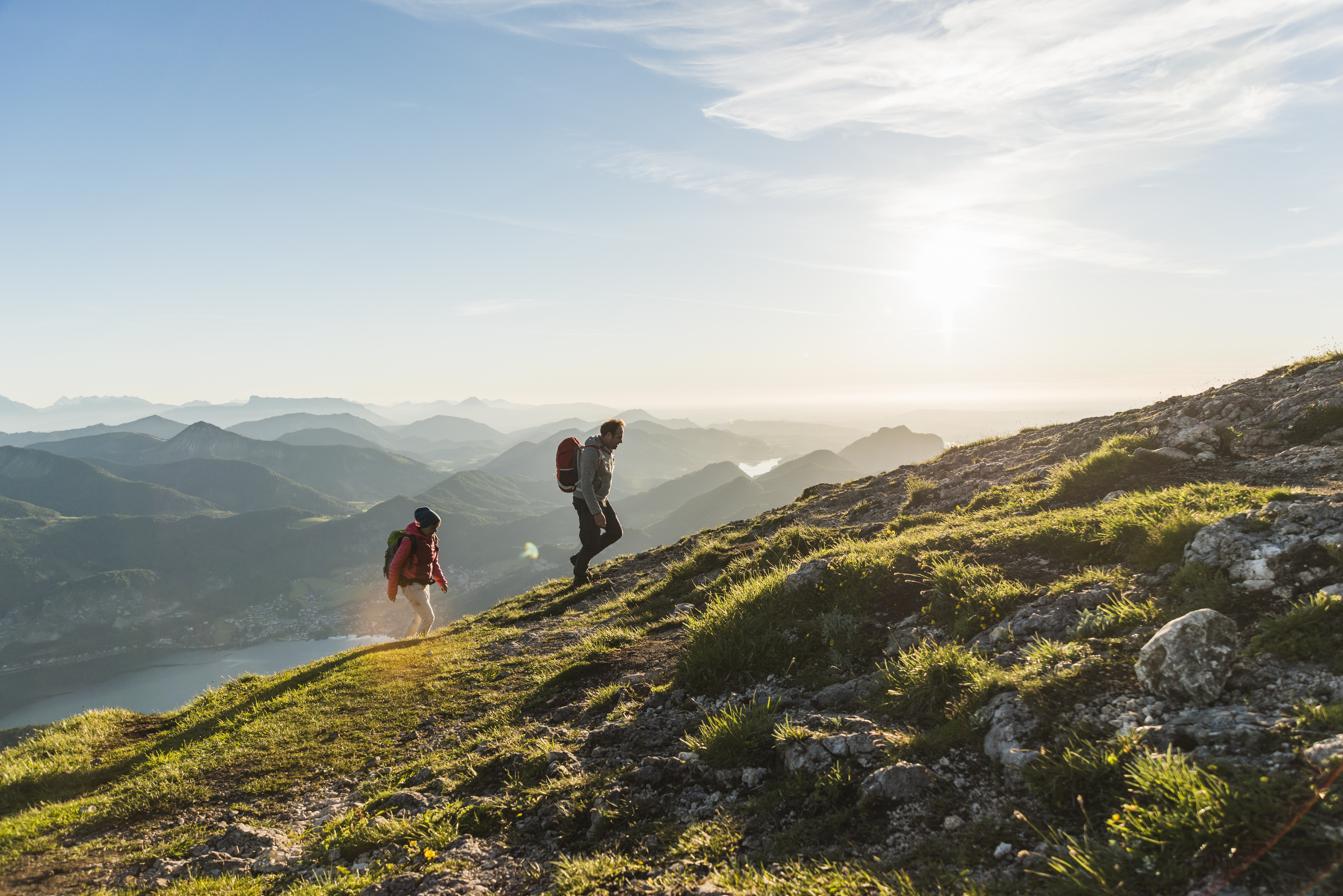 hikers-climbing-mountain-ridge