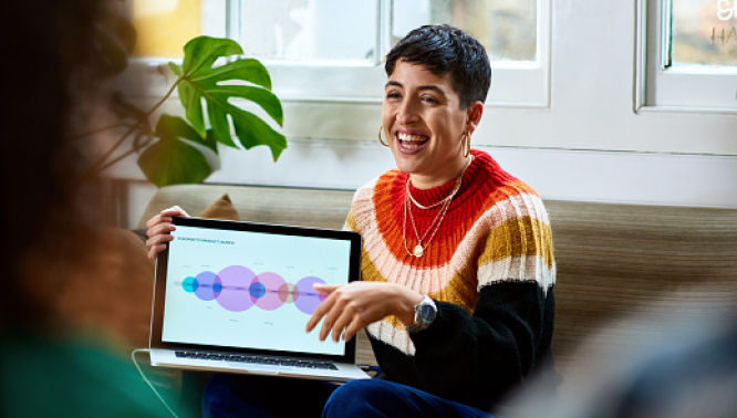 banking woman presenting laptop