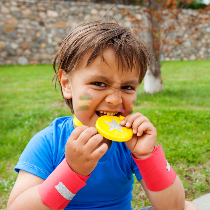 Business banking boy biting medal
