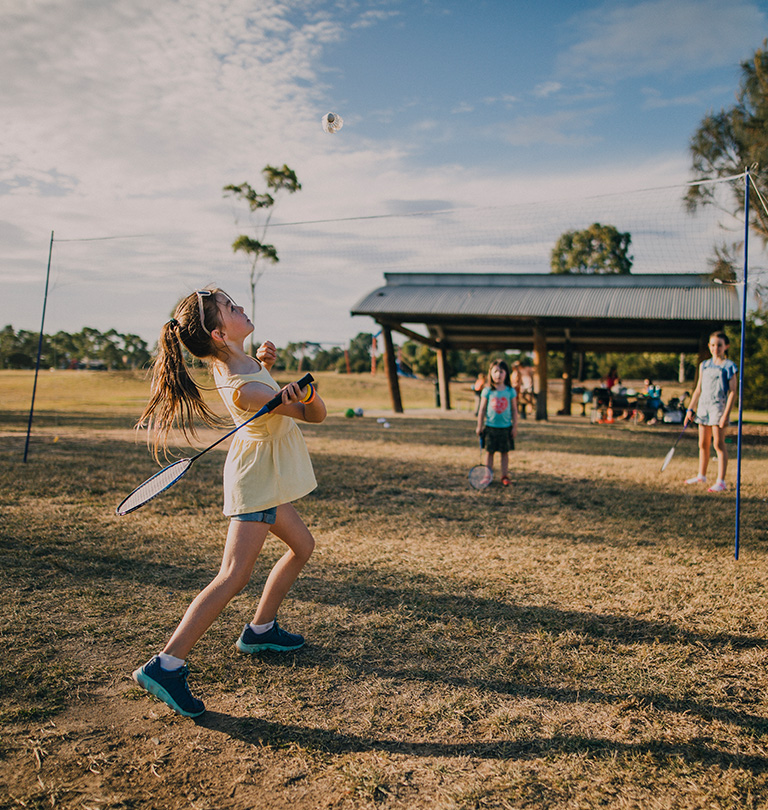Girl playing badminton