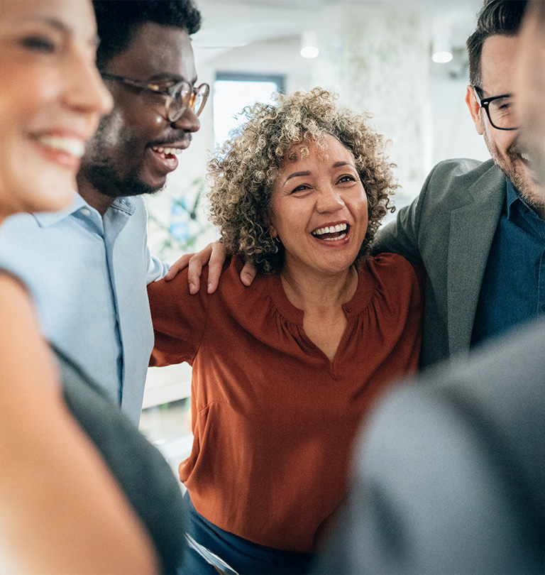 cheering teamwork in office