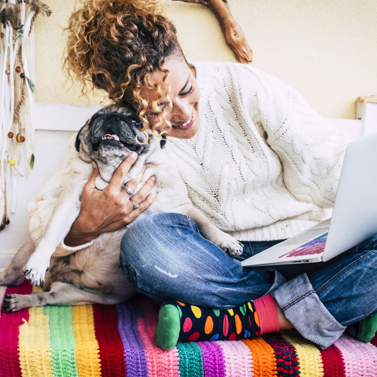 Woman hugging dog