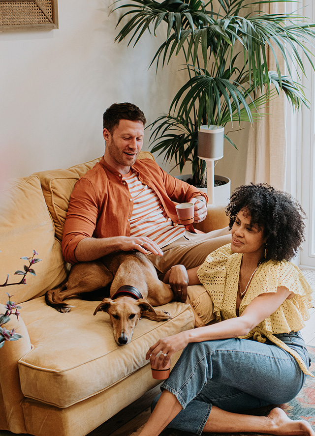 Couples siting with dog