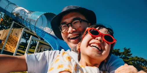 Father and daughter on rollercoaster