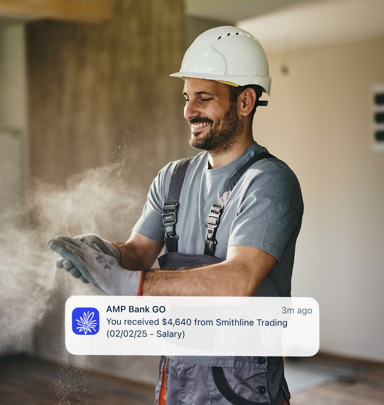 Real time bank alert over tradesman dusting off hands