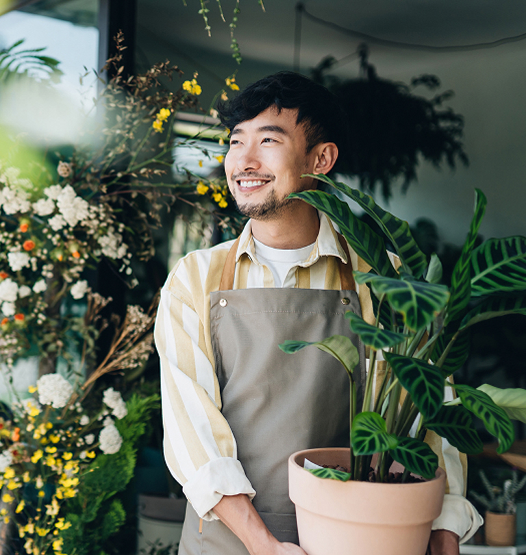 Man with pot plant