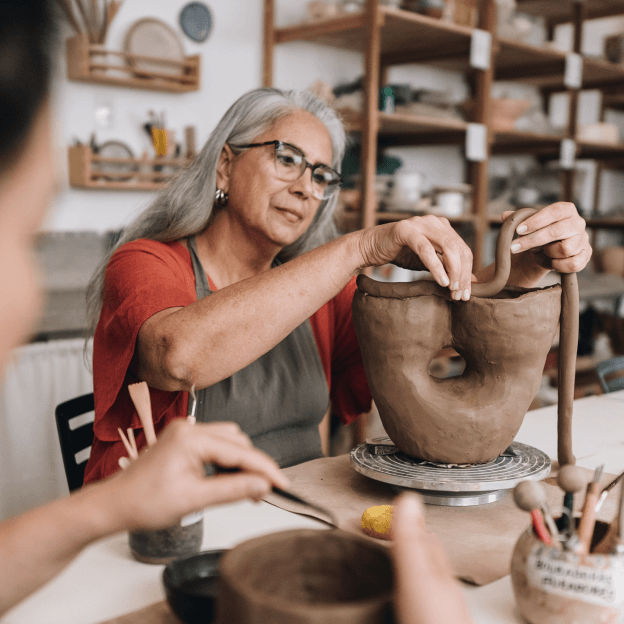 Woman making pottery