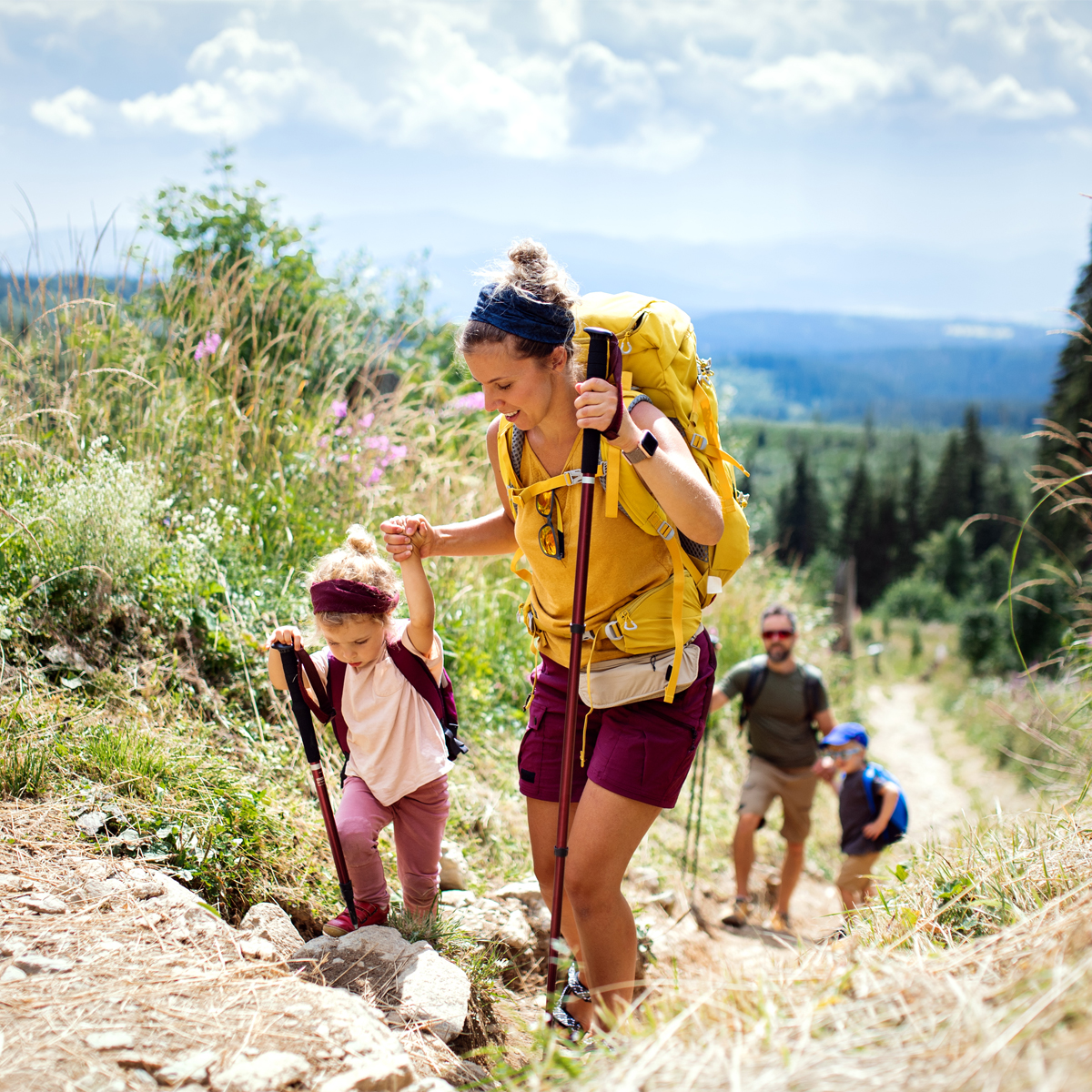 Family hiking walking poles