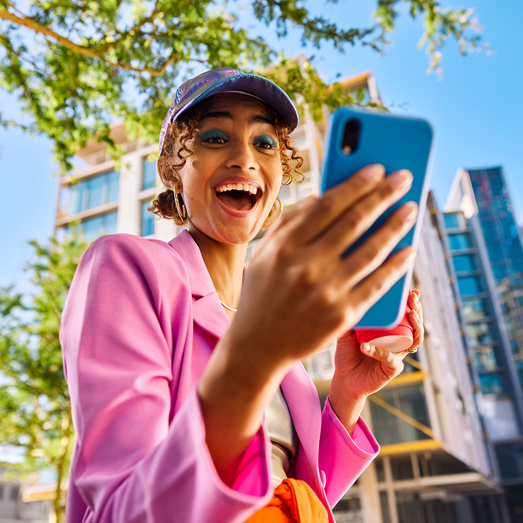 Laughing women with phone
