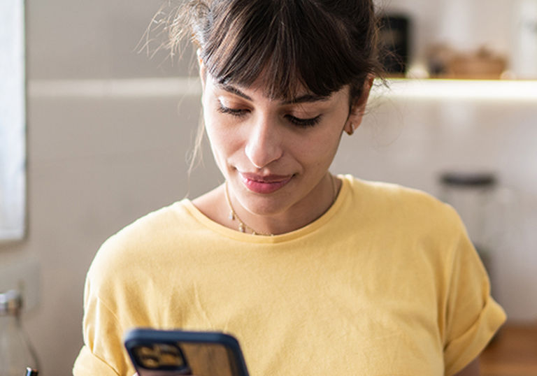 Woman with phone in hand