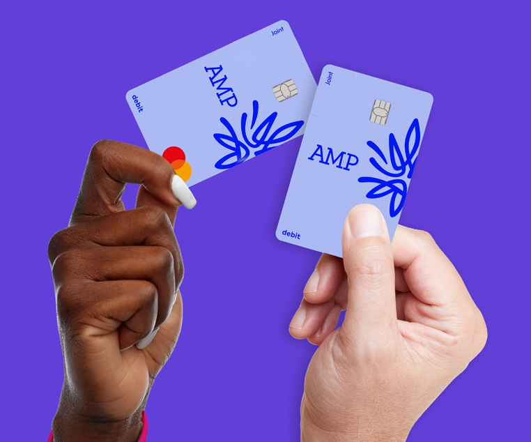 two hands with cards