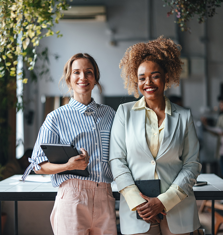 Two women in office wear