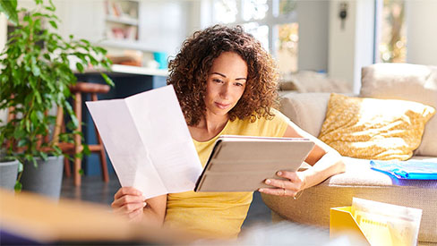 Woman looking over papers