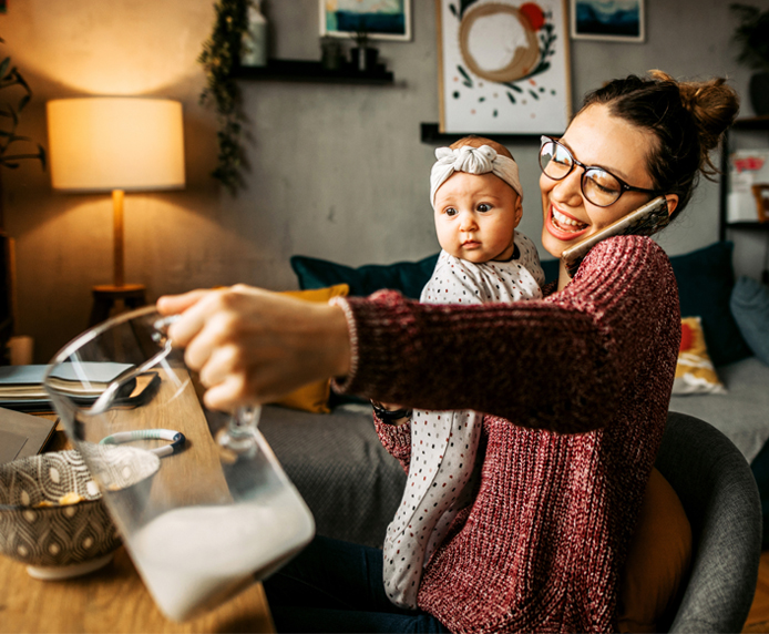 Mum and baby with jug of milk