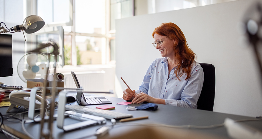 red hair woman working 