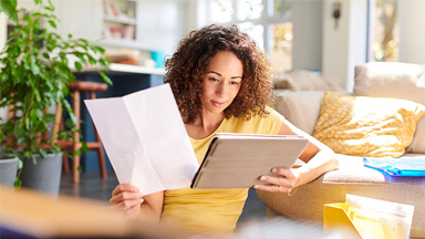 lady-reading-investment-docs